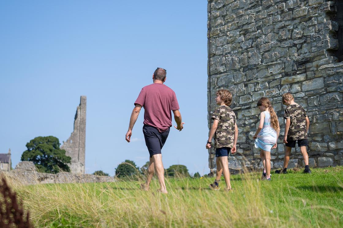 Family exploring Trim Castle