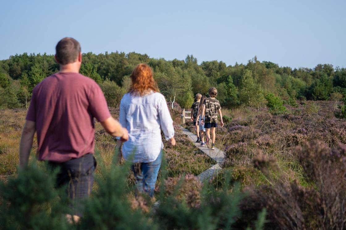 Family on boardwalk at Girley Bog Eco Walk 